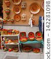 Painted plates from open-air stalls in Granada, Spain 142281098