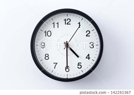 A clock showing 4:30 A clock showing 4:30 142281367