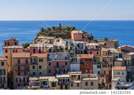 Manarola in Liguria, Italy with balconies and cultivated roofs in clear weather Manarola in Liguria, Italy with balconies and cultivated roofs in clear weather 142281593