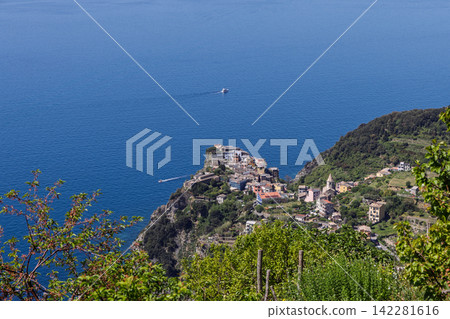 Corniglia within Liguria, Italy from an elevated viewpoint on the trail Corniglia within Liguria, Italy from an elevated viewpoint on the trail 142281616