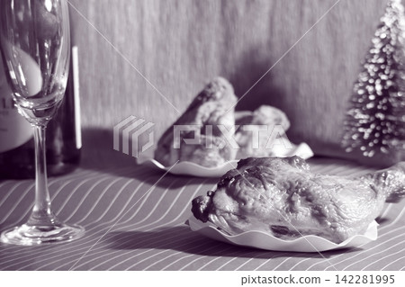 Christmas decorations: chicken, champagne, and a Christmas tree. Christmas decorations: chicken, champagne, and a Christmas tree. 142281995