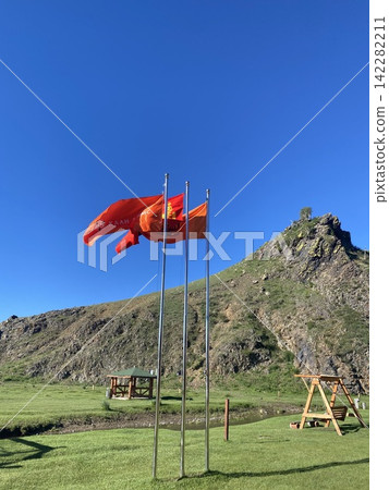 The Mongolian flag and mountains 142282211