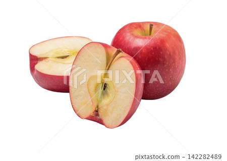 PNG image of one cutout of a crisp pink apple and two halves of the apple. PNG image of one cutout of a crisp pink apple and two halves of the apple. 142282489