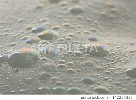 Many bubbles foam from soap bath shampoo shower gel on surface. Fluffy bath foam or beer bubble froth on surface wave curve texture form bubble Many bubbles foam from soap bath shampoo shower gel on surface. Fluffy bath foam or beer bubble froth on surface wave curve texture form bubble 142284385