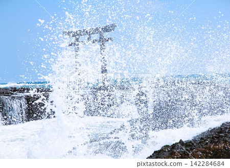Torii gate and waves at Oarai Beach Torii gate and waves at Oarai Beach 142284684