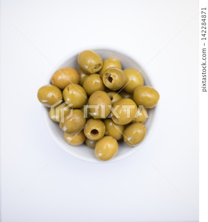three green olives isolated on white 142284871