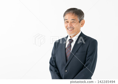 Senior man in a suit, conversation Senior man in a suit, conversation 142285494