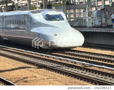 Shinkansen arriving at Himeji Station Shinkansen arriving at Himeji Station 142286421