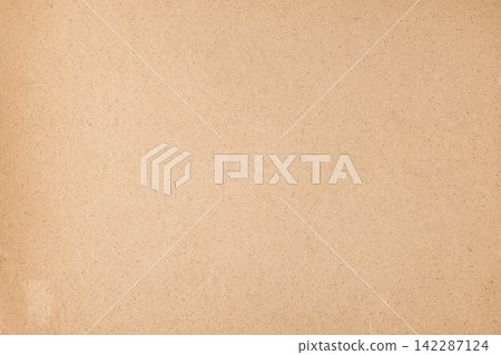 Old parchment paper with visible brown dots stains 142287124