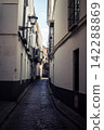 Santa Cruz: Seville's Vibrant Economic Heart 142288869