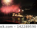 Splendid fireworks blooming on the sea 142289590