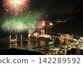 Splendid fireworks blooming on the sea 142289592