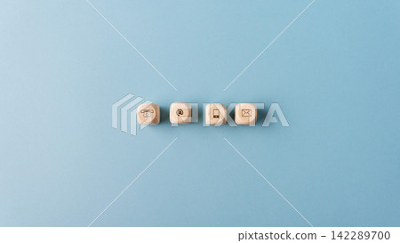 Contact and communication icons on wooden dices 142289700