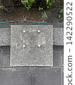 A gray concrete texture background material with a cracked and grainy, inorganic feel. 142290522