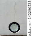 Cracked white wall and circular window texture material 142290523