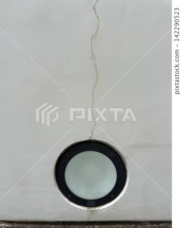 Cracked white wall and circular window texture material Cracked white wall and circular window texture material 142290523