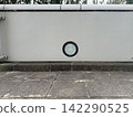 Minimalist gray walls with small round windows and modern architectural design 142290525