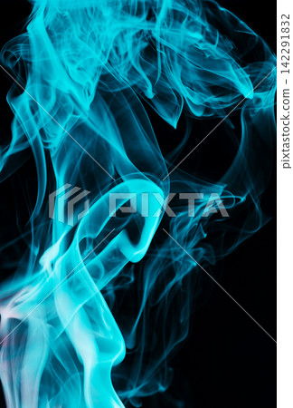 Abstract blue smoke swirls isolated on black background Abstract blue smoke swirls isolated on black background 142291832