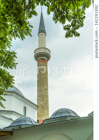 a minaret among the roofs of Sarajevo a minaret among the roofs of Sarajevo 142291892