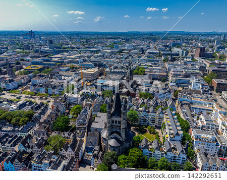 High angle wide horizontal aerial drone photograph of city center, Antoniterkirche, Oper Koln, Colonius TV tower, and urban skyline in Cologne, North Rhine-Westphalia, Germany, Central Europe High angle wide horizontal aerial drone photograph of city center, Antoniterkirche, Oper Koln, Colonius TV tower, and urban skyline in Cologne, North Rhine-Westphalia, Germany, Central Europe 142292651