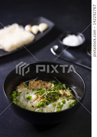 pho soup with duck breast and green peas pho soup with duck breast and green peas 142292767