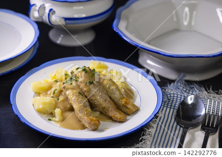 rabbit with cream sauce and mashed potatoes rabbit with cream sauce and mashed potatoes 142292776