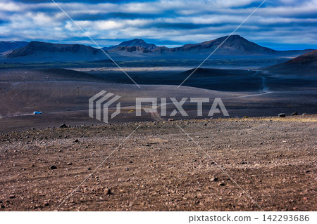 Volcanic Landscape with Mountains and Lava Fields in Iceland Volcanic Landscape with Mountains and Lava Fields in Iceland 142293686