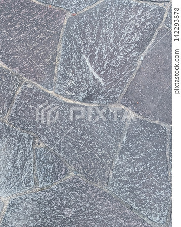 Irregularly shaped stone paving combining black and gray natural stones / Heavy, substantial stone texture and background material Irregularly shaped stone paving combining black and gray natural stones / Heavy, substantial stone texture and background material 142293878