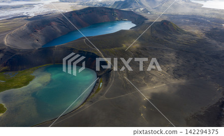 Aerial view of crater lakes with turquoise water, Rang?r?ing ytra Iceland Aerial view of crater lakes with turquoise water, Rang?r?ing ytra Iceland 142294375