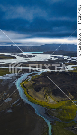 Aerial view of glacial rivers and braided streams in ytra, Iceland Highlands Aerial view of glacial rivers and braided streams in ytra, Iceland Highlands 142294495