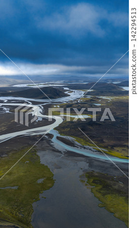 Aerial view of braided glacial rivers and lava fields, ytra Iceland Aerial view of braided glacial rivers and lava fields, ytra Iceland 142294513
