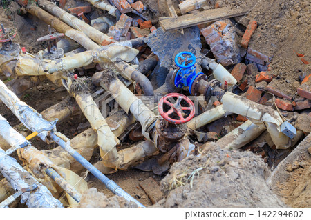 Construction Site Trench for Pipe Repair and Multiple Insulated Lines Construction Site Trench for Pipe Repair and Multiple Insulated Lines 142294602