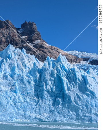 Vertical View of Jagged Blue Ice Seracs at Spegazzini Glacier Vertical View of Jagged Blue Ice Seracs at Spegazzini Glacier 142294763