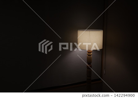 Floor lamp. Lighting that shines in a dark room. Indirect lighting. Floor lamp. Lighting that shines in a dark room. Indirect lighting. 142294900