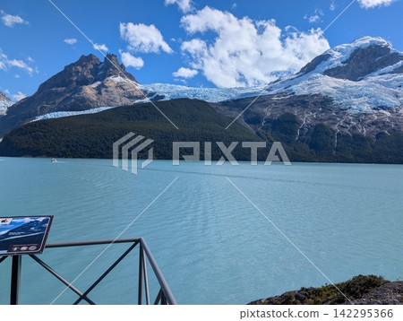 Spegazzini Glacier, Argentina - March 11, 2026: viewpoint over a turquoise glacial lake and mountains Spegazzini Glacier, Argentina - March 11, 2026: viewpoint over a turquoise glacial lake and mountains 142295366