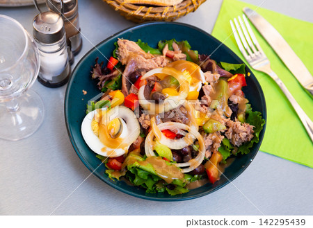 Traditional dish of French cuisine is the Nicoise salad Traditional dish of French cuisine is the Nicoise salad 142295439
