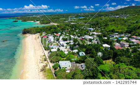 Scenery of the sea and village in Nakijin Village, northern Okinawa Island Scenery of the sea and village in Nakijin Village, northern Okinawa Island 142295744