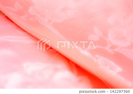 Background pink silk clouth wave abstract texture soft tablecloth cotton textile backdrop cosmetic beauty template presentation, silky velvet linen mockup cloth dress curtain backdrop clothing. Background pink silk clouth wave abstract texture soft tablecloth cotton textile backdrop cosmetic beauty template presentation, silky velvet linen mockup cloth dress curtain backdrop clothing. 142297360