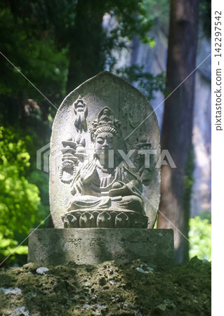 Stone Buddha statues at a mountain temple in summer (Yamagata City, Yamagata Prefecture) Stone Buddha statues at a mountain temple in summer (Yamagata City, Yamagata Prefecture) 142297542