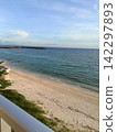 A view of the beach in Yomitan, Okinawa Prefecture, on a July morning from a window. 142297893
