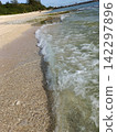 A resort on the west coast of Okinawa Prefecture, at the water's edge of a private beach. 142297896