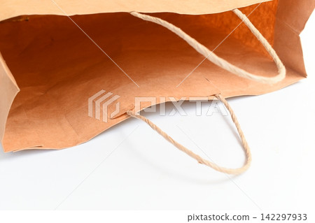 brown paper bag isolated on white background, recycle material brown paper bag isolated on white background, recycle material 142297933