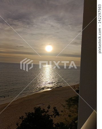 Sunset from a window in Yomitan, Okinawa Prefecture, around 7 PM on July 1st. Sunset from a window in Yomitan, Okinawa Prefecture, around 7 PM on July 1st. 142297983