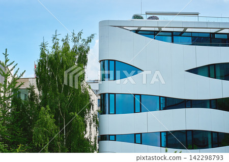 Contemporary Office Building with Curved Glass Facade Contemporary Office Building with Curved Glass Facade 142298793