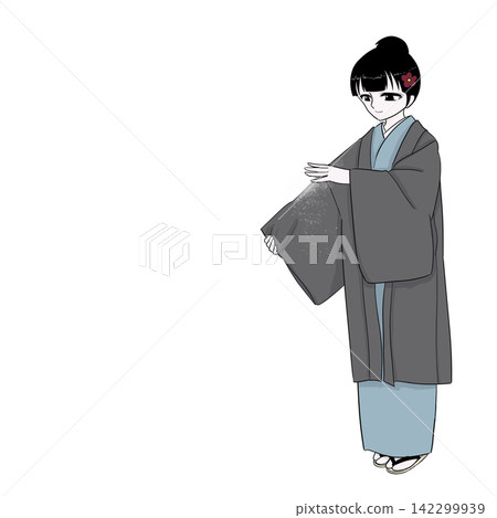 A woman brushes snow off her kimono in a winter snowscape. A woman brushes snow off her kimono in a winter snowscape. 142299939