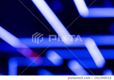 Abstract bokeh background with lines of blue light overlapping in a fantastical way. Abstract bokeh background with lines of blue light overlapping in a fantastical way. 142300018