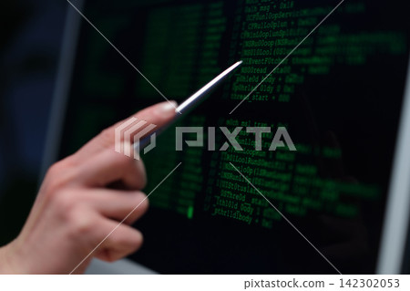 Computer technician examines damaged desktop computer Computer technician examines damaged desktop computer 142302053