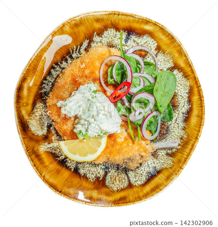 Breaded pork schnitzel with creamy sauce and fresh salad isolated top view gourmet restaurant dish Breaded pork schnitzel with creamy sauce and fresh salad isolated top view gourmet restaurant dish 142302906