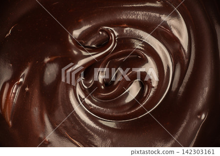 Glossy Melted Dark Chocolate Swirl Macro 142303161