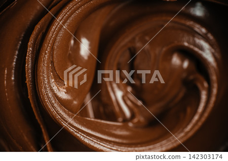 Glossy Chocolate Cream Swirl Macro Glossy Chocolate Cream Swirl Macro 142303174